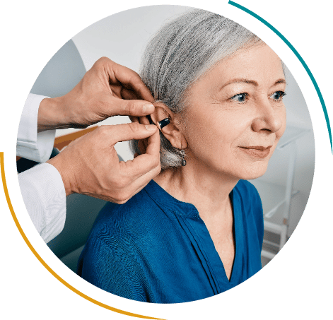 Woman getting hearing aid fitting at Better Hearing Audiology in Albuquerque, NM